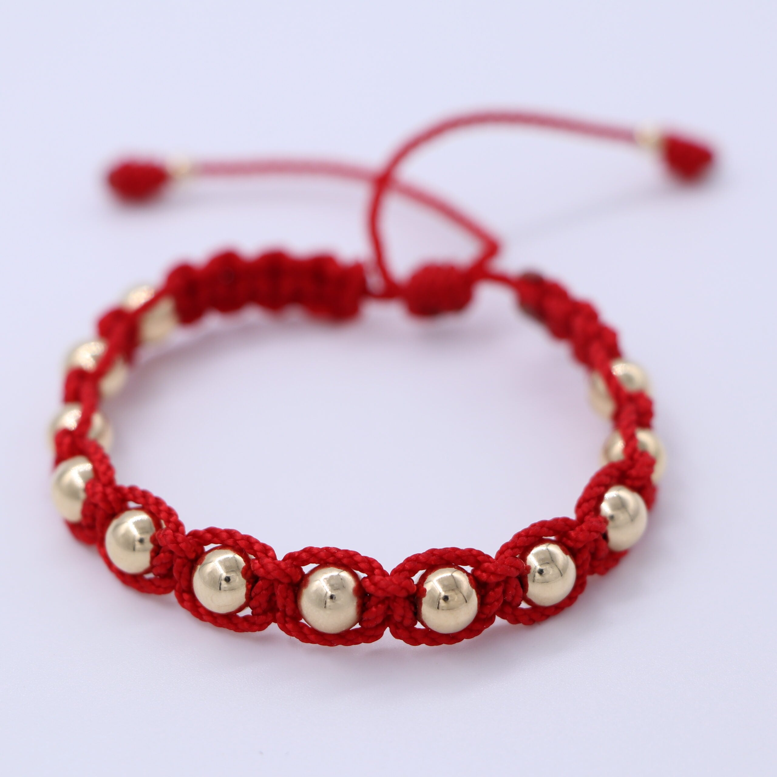 BRAZALETE ROJO EN MACRAMÉ BALÍN ORO LAMINADO 18K - 1