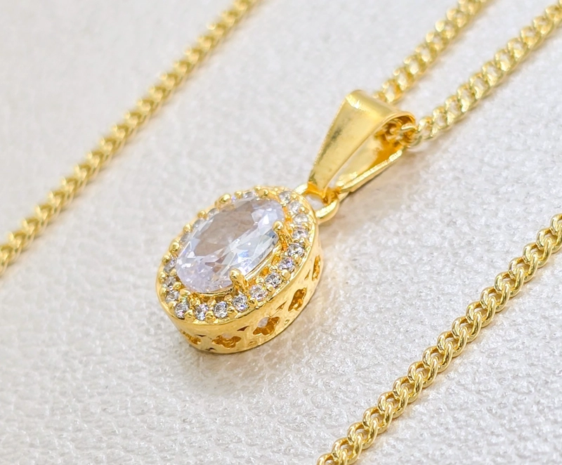 DIJE OVALADO CIRCONIAS EN ORO LAMINADO 18K - 1