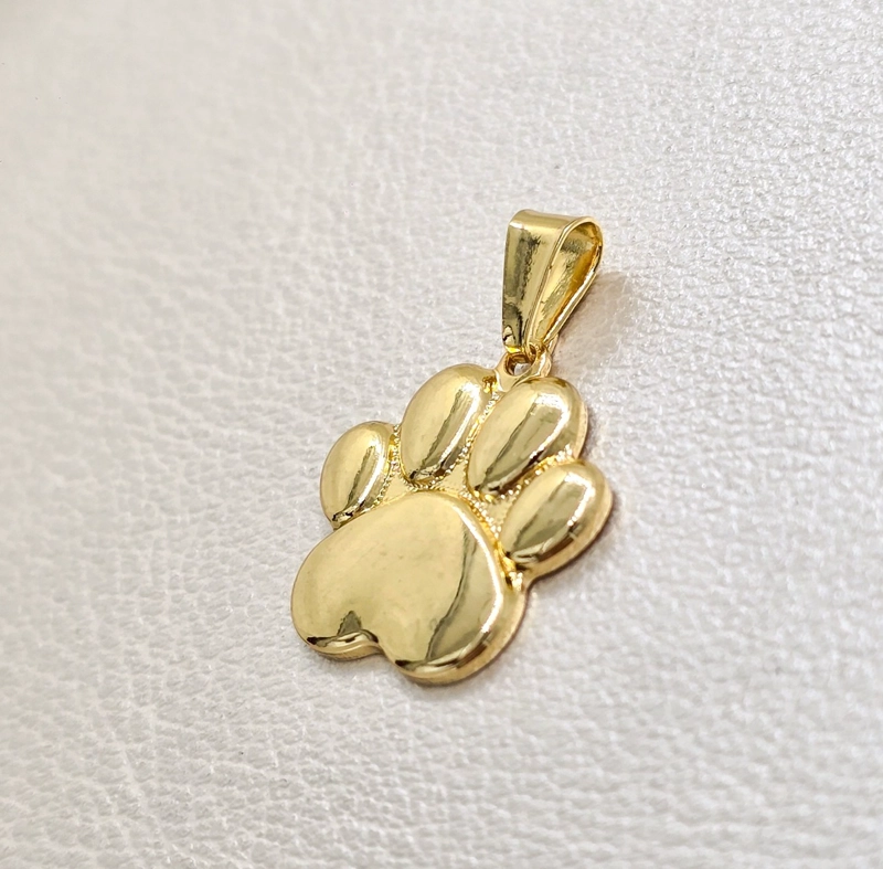 COLGANTE HUELLA PERRO ORO LAMINADO 18K - 1