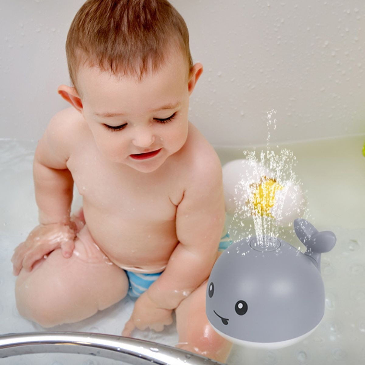 JUGUETE DE BAÑO BALLENA CON LUZ FUENTE AGUA FLOTANTE LAU - 8