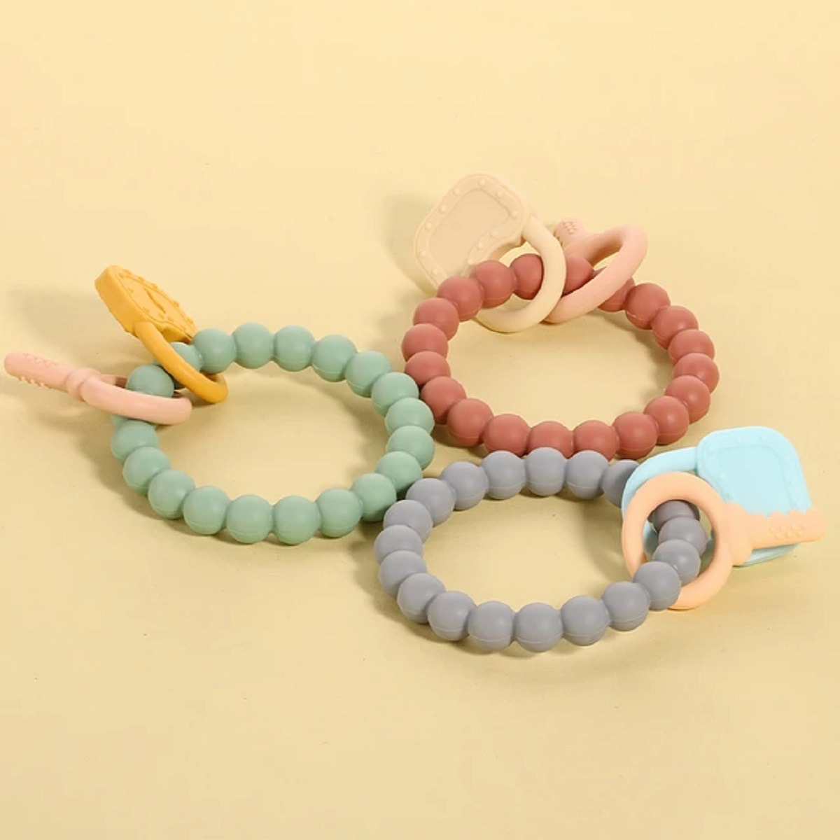 SET 3 MORDEDOR SILICONA PULSERA BEBÉ ALIVIO ENCÍAS JHN MULTICOLOR - 2
