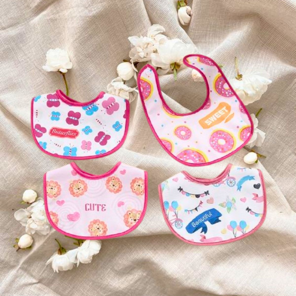 SET 6 BABEROS ESTAMPADOS IMPERMEABLE DIVERTIDO BEBE LAU - 10