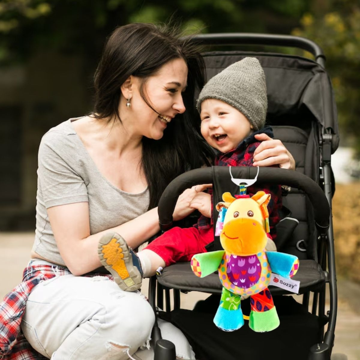 SONAJERO PELUCHE COLGANTE MUSICAL SENSORIAL BEBE LAU - 10