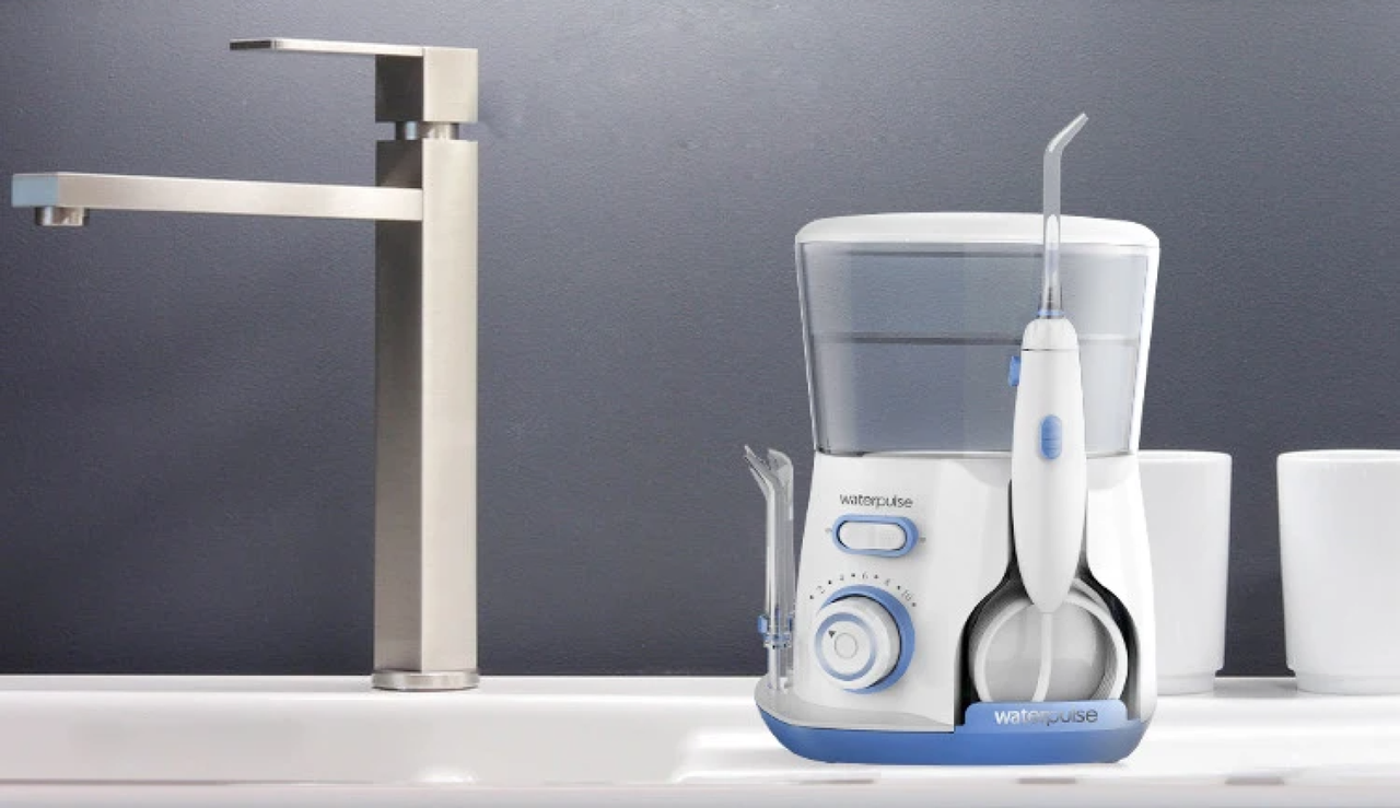 IRRIGADOR ORAL DENTAL ELIMINADOR SARRO PORTATIL LAU - 2