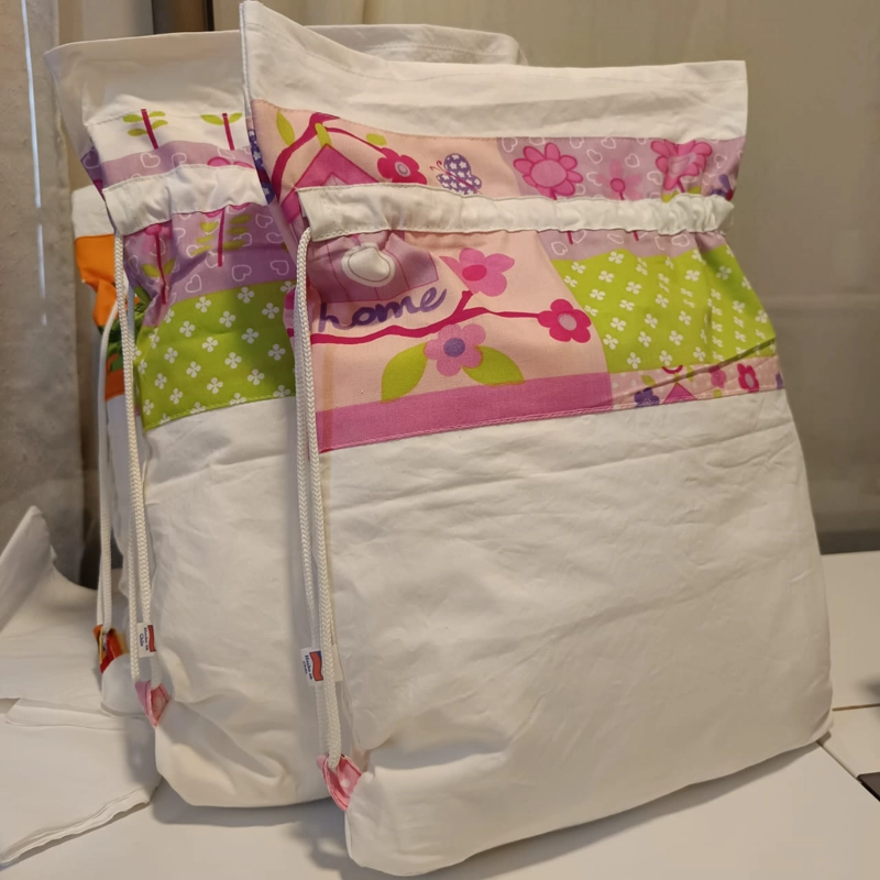 SABANAS UNIDAS CON MEDIDAS JUNJI CON BOLSA DE ALGODON. - 2