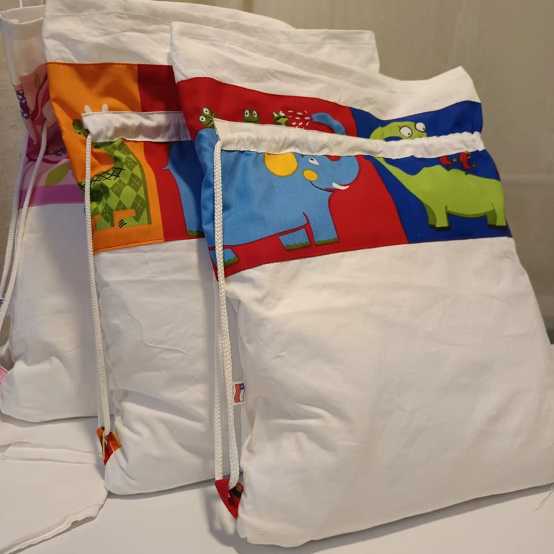 SABANAS UNIDAS CON MEDIDAS JUNJI CON BOLSA DE ALGODON. - 2