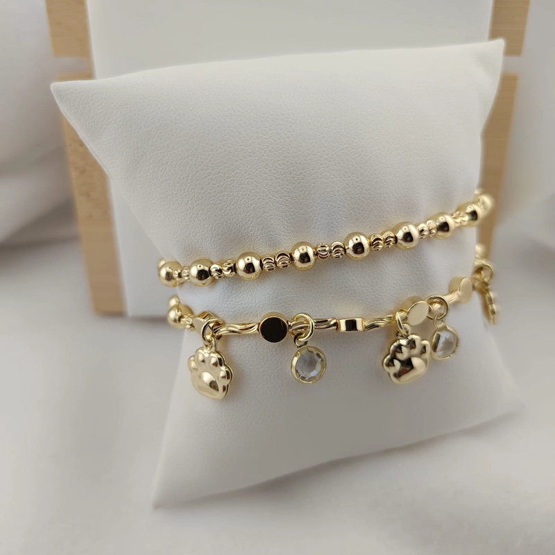 PULSERA ESFERAS ELASTICADA BAÑO DE ORO - 1