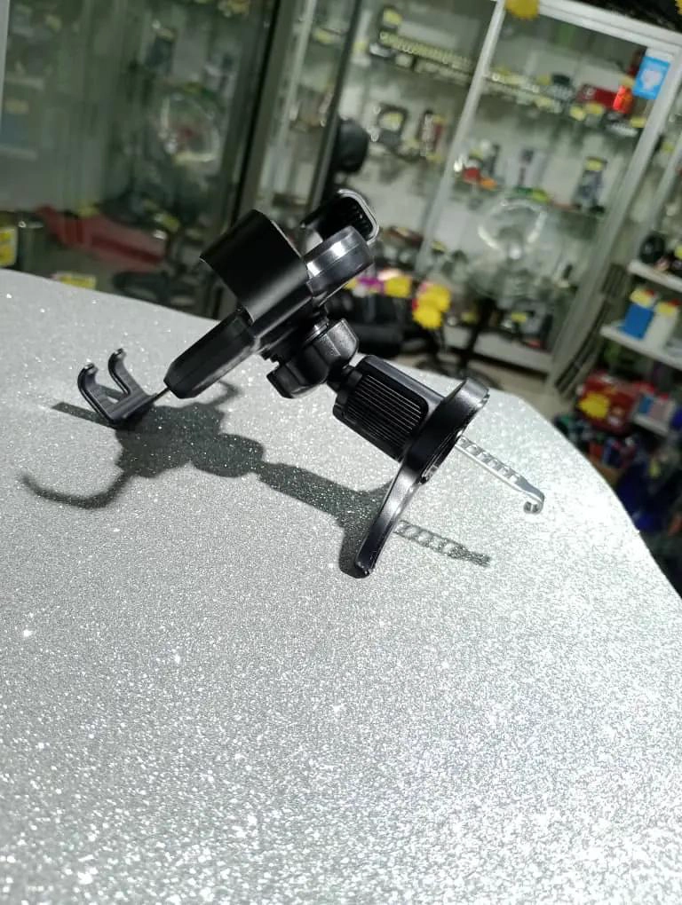 SOPORTE PARA TELE FONO MOVIL CON CLIP PARA AUTOS - 2