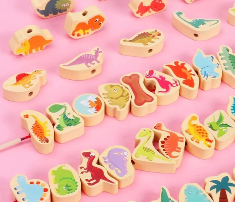 JUGUETE DIDACTICO DE DINOSAURIOS DE MADERA PARA HILAR - 4