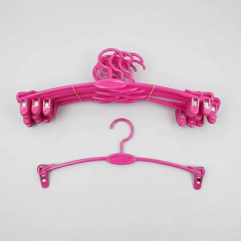 SET DE 30 COLGADORES DE PLASTICO COLOR ROSA TAMAÑO 26X11 CM - 1