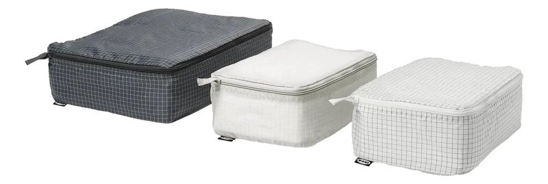 ORGANIZADOR DE VIAJE PARA ROPA EN POLIE STER CON DISEÑO A CUADROS GRIS Y NEGRO - 1