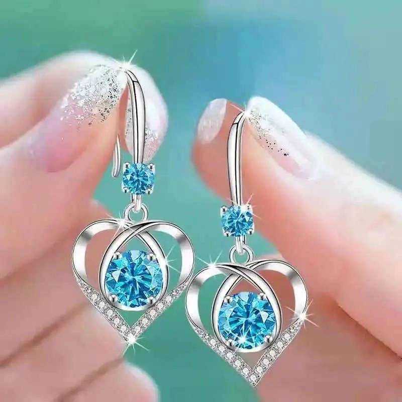 AROS CON DISEÑO DE CORAZON Y CIRCONES EN PLATA ESTERLINA - 1