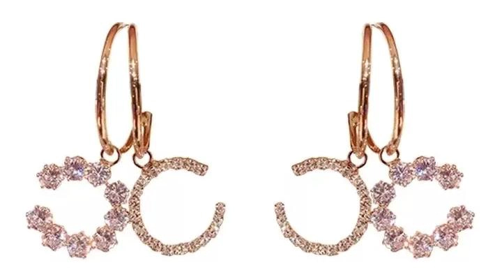 AROS ELEGANTES CON DISEÑO BRILLANTE Y ACABADO ROSADO - 1