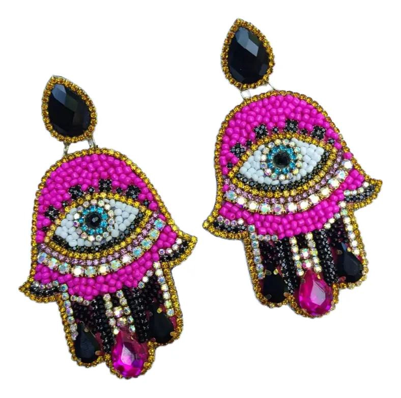 AROS DELICADOS CON DISEÑO DE MANO Y DETALLES EN STRASS BRILLANTES - 1