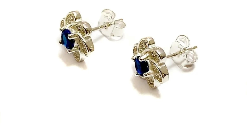 AROS CON DISEÑO DE FLOR Y CIRCON AZUL EN PLATA FINA 925 - 2