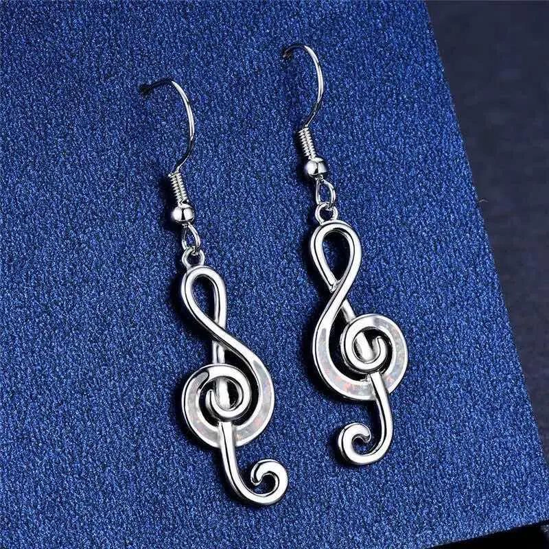 AROS PARA MUJER CON DISEÑO DE LLAVE DE SOL EN METAL - 4