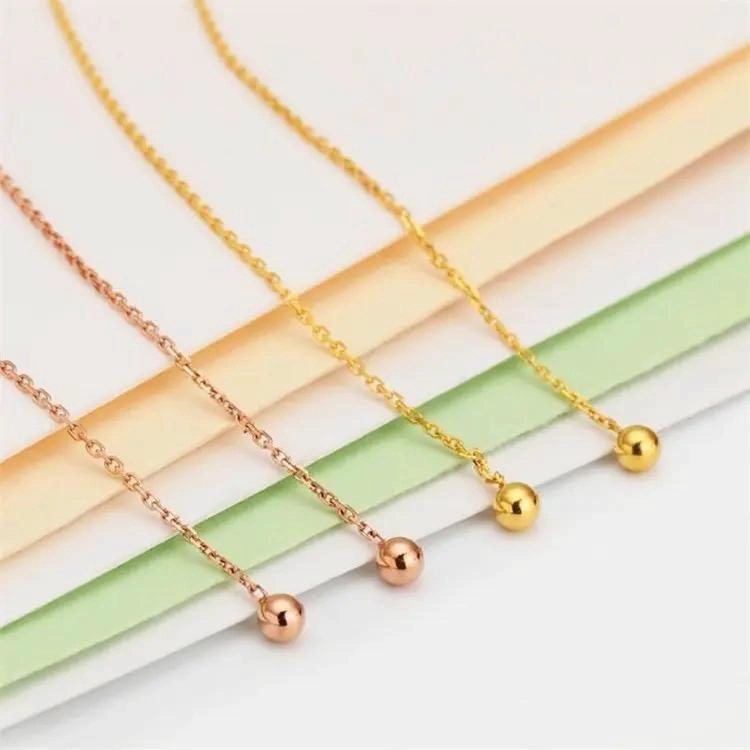 AROS LARGOS CON DISEÑO DE CADENA Y DETALLE DE PELOTITA EN ACABADO DORADO - 3
