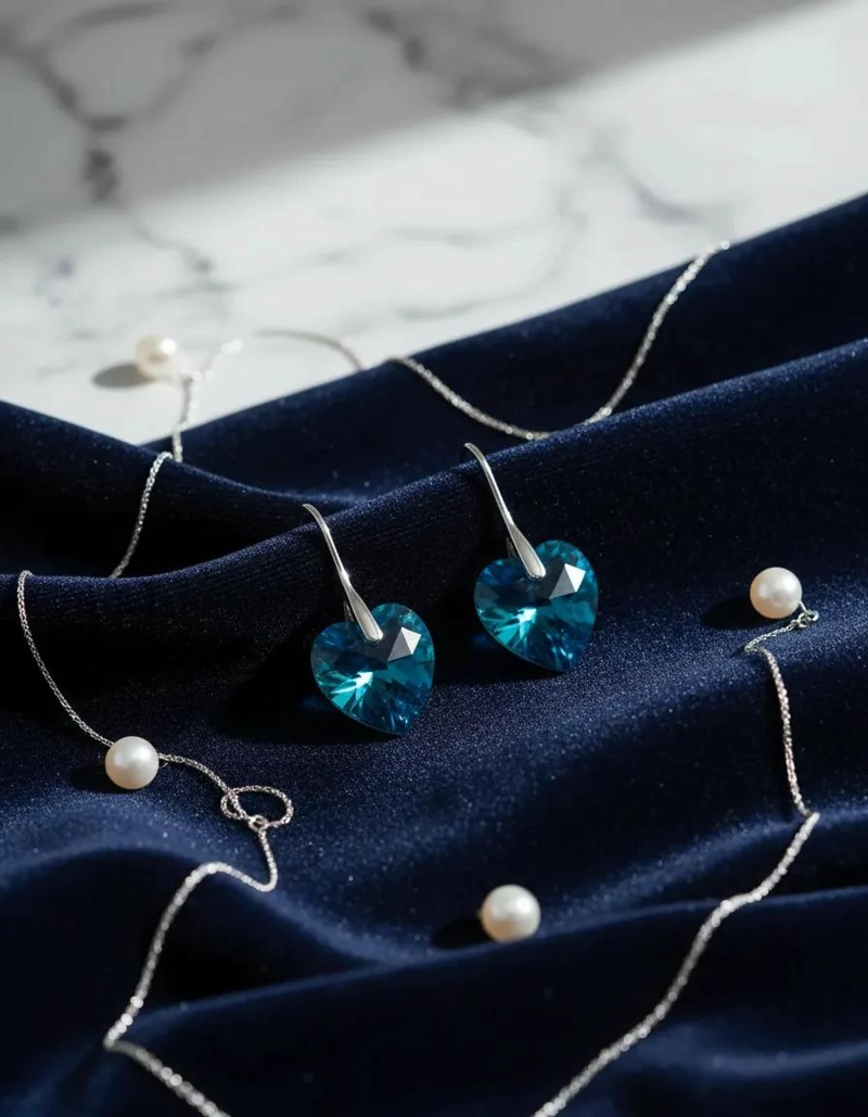 AROS DE PLATA 925 CON CRISTAL AZUL EN FORMA DE ROMBO - 1