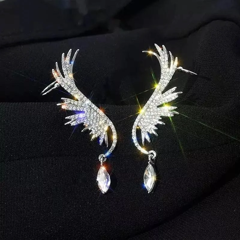 ARETES CON DISEÑO DE ALAS EN ACABADO PLATEADO ELEGANTE - 2