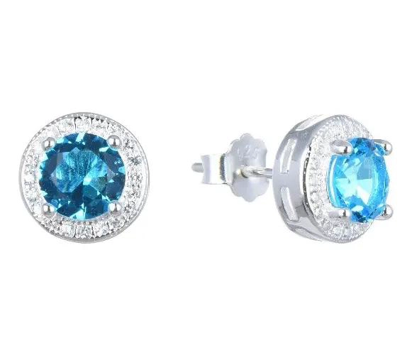 AROS CON DISEÑO DE ROSETA Y CIRCONES CELESTES EN PLATA FINA 925 - 1