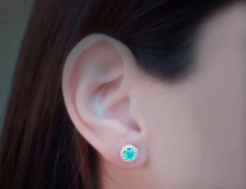 AROS CON DISEÑO DE ROSETA Y CIRCONES CELESTES EN PLATA FINA 925 - 2