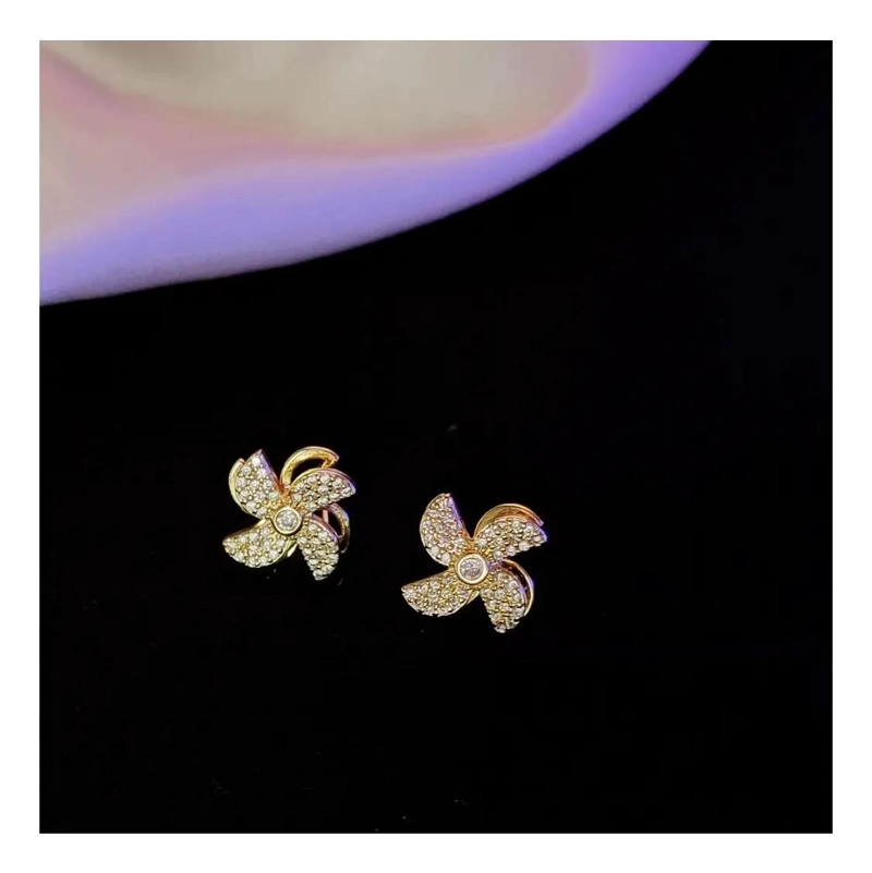 PENDIENTES CON DISEÑO DE MOLINO GIRATORIO EN PLATA Y ORO 14K - 2