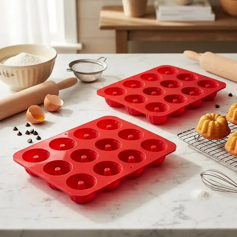 SET DE 2 MOLDES DE SILICONA PARA REPOSTERIA CON CAPACIDAD PARA 12 CUPCAKES CADA - 1
