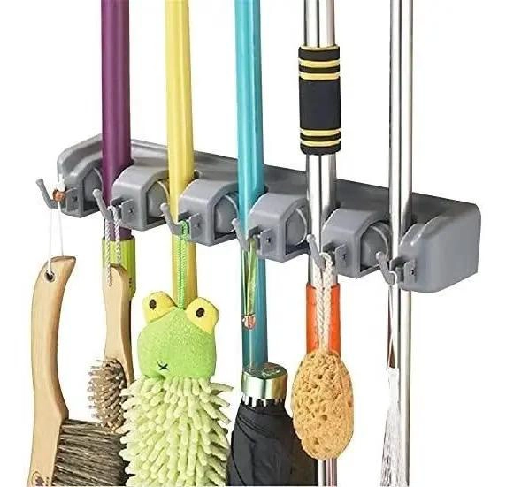 ORGANIZADOR DE PARED PARA ESCOBAS Y HERRAMIENTAS CON 5 ESPACIOS - 1