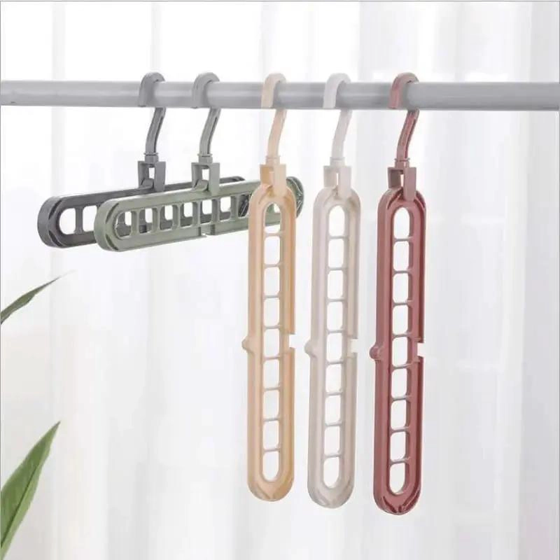 PACK DE 5 PERCHEROS COLGADORES MAGICOS PARA AHORRO DE ESPACIO - 4