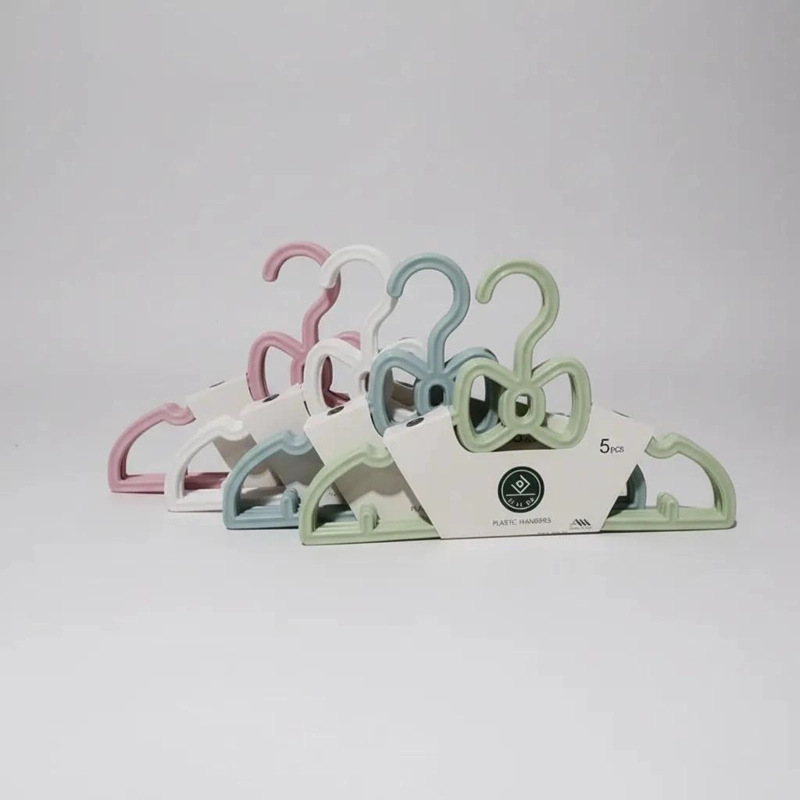 PACK DE 9 COLGADORES PLASTICOS PARA ROPA DE 28 CM - 1