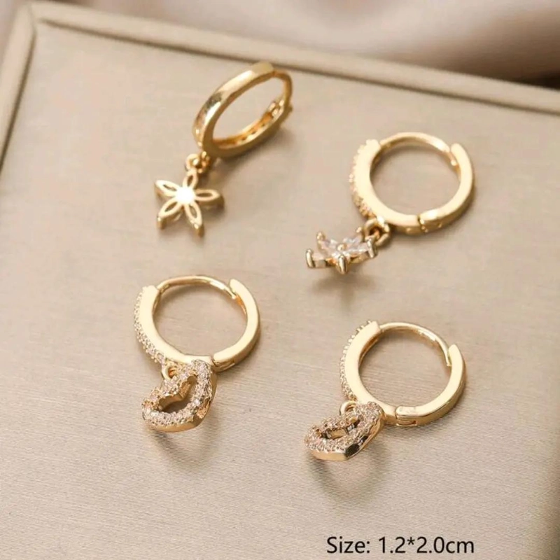 SET DE AROS ELEGANTES CON VARIAS PERFORACIONES EN BAÑO DE ORO 18K - 4