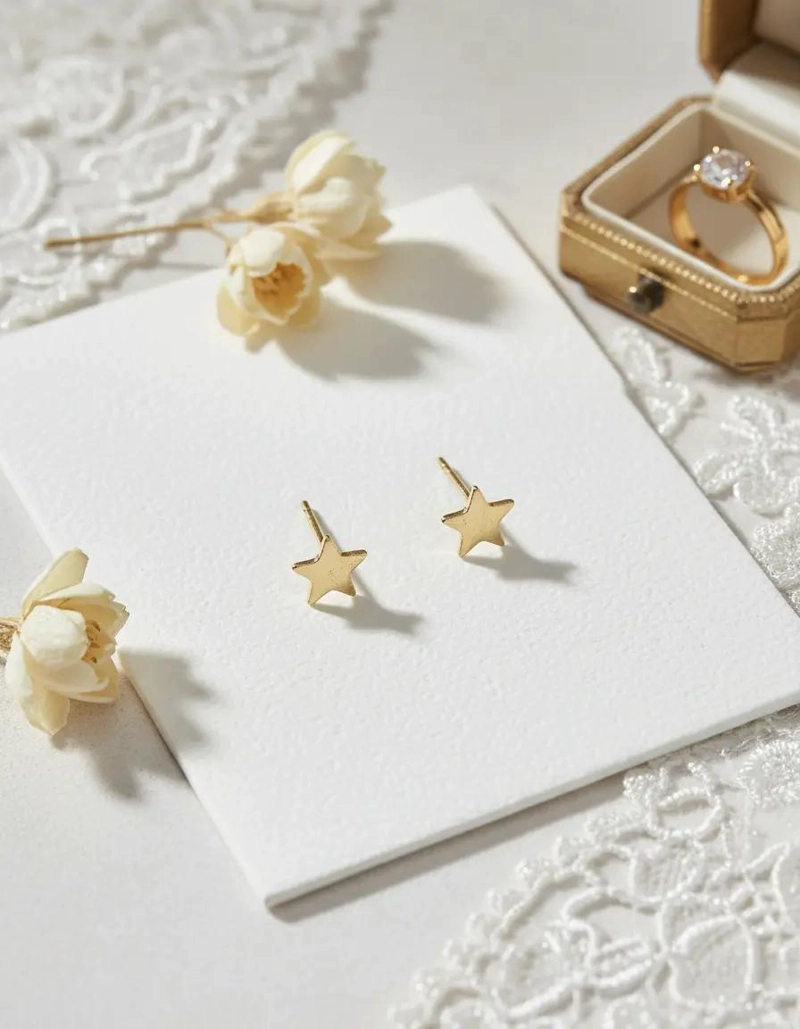 AROS DE ORO 18 KILATES CON DISEÑO DE ESTRELLAS PARA BEBE - 2