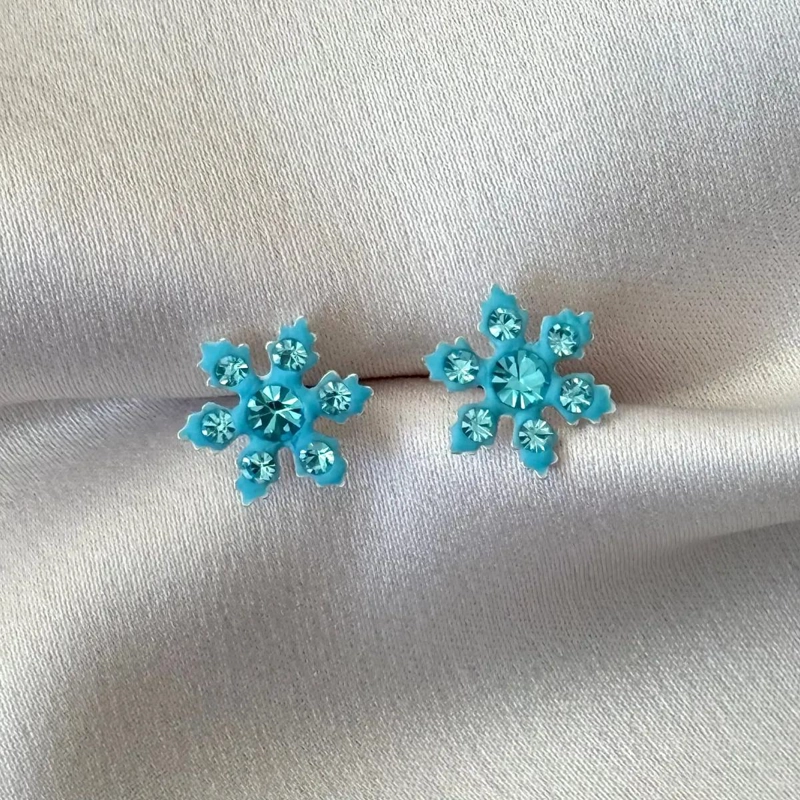 AROS DE PLATA 925 CON DISEÑO DE COPO DE NIEVE CELESTE - 1