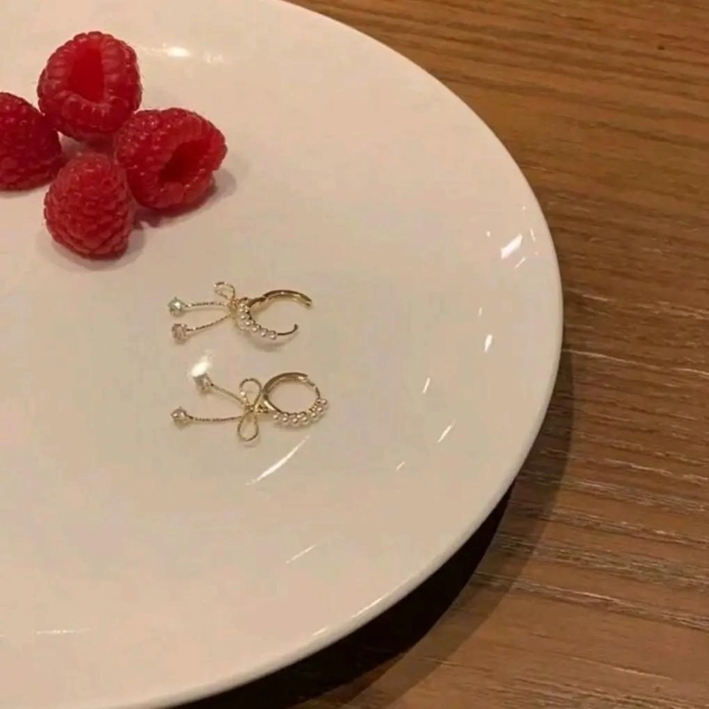 AROS ELEGANTES DE ACERO LAMINADO CON PERLAS Y LAZO - 4