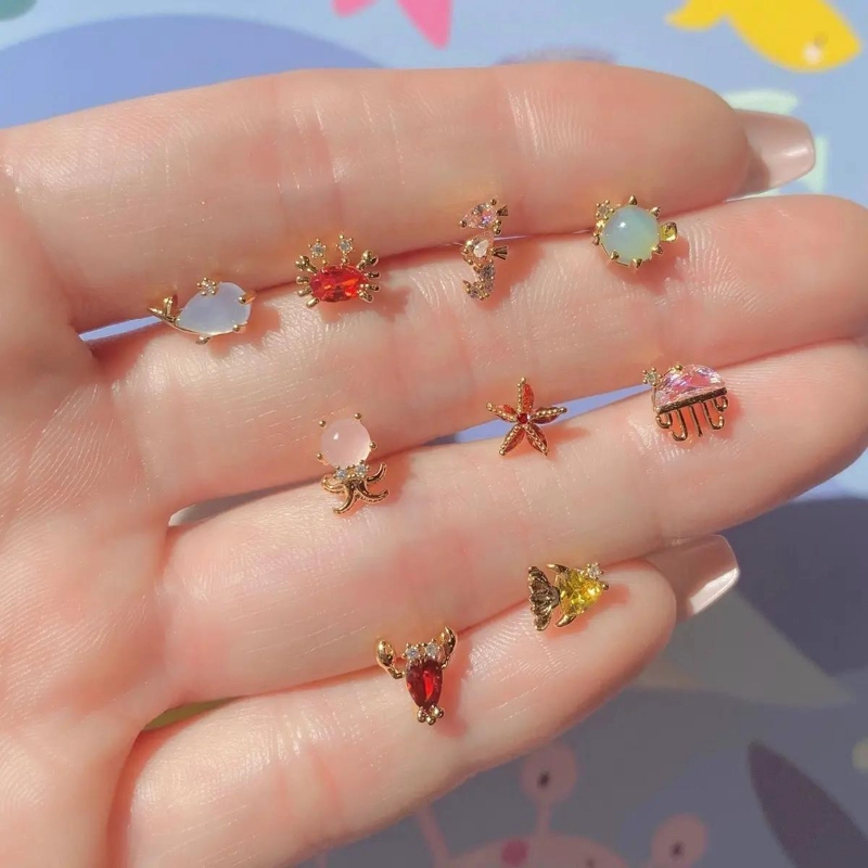 AROS MINIMALISTAS ESTRELLA DE MAR BAÑO DE ORO 18K - 5