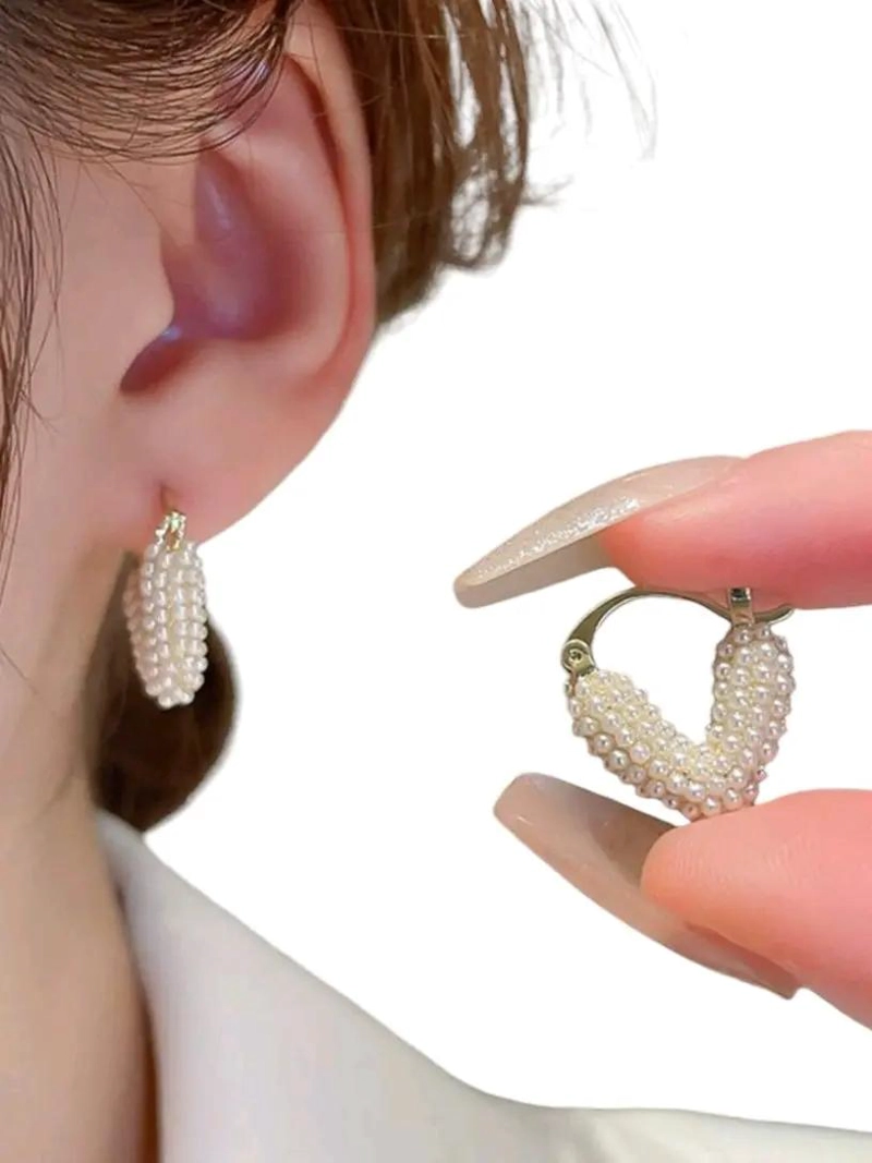AROS DE CORAZON CON PERLAS ELEGANTES EN ORO 18K - 1