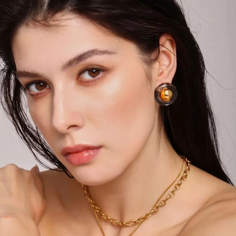 AROS BAÑADOS EN ORO 18K CON RESINA NEGRA EXCLUSIVOS - 2