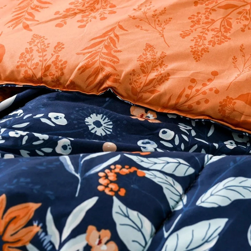 PLUMON REVERSIBLE 1.5 PLAZAS CON MICROFIBRA Y DISEÑO FLOREADO MULTICOLOR - 2