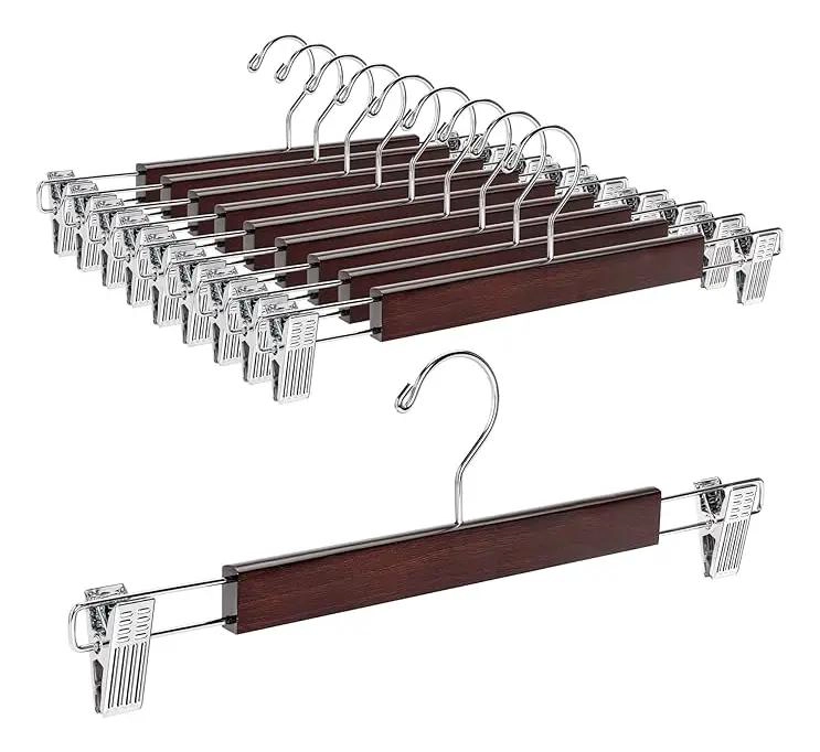 SET DE 20 COLGADORES DE MADERA PARA PANTALON CON PINZAS - 1