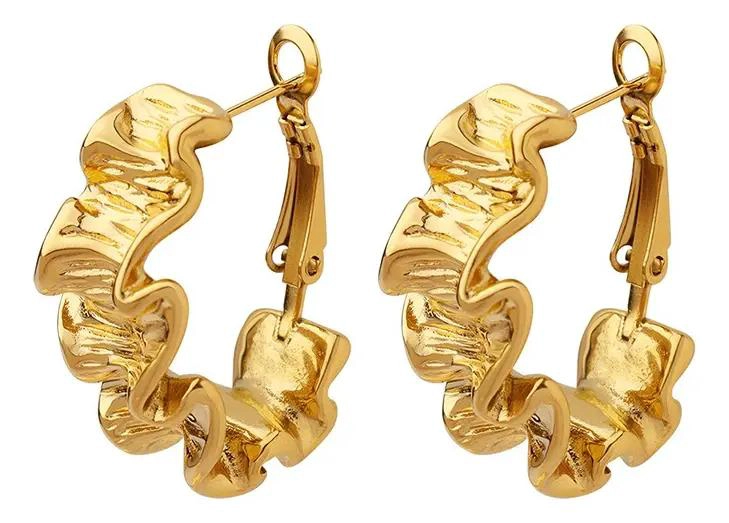AROS DE BAÑO EN ORO AMARILLO 18K CON DISEÑO EXCLUSIVO - 1