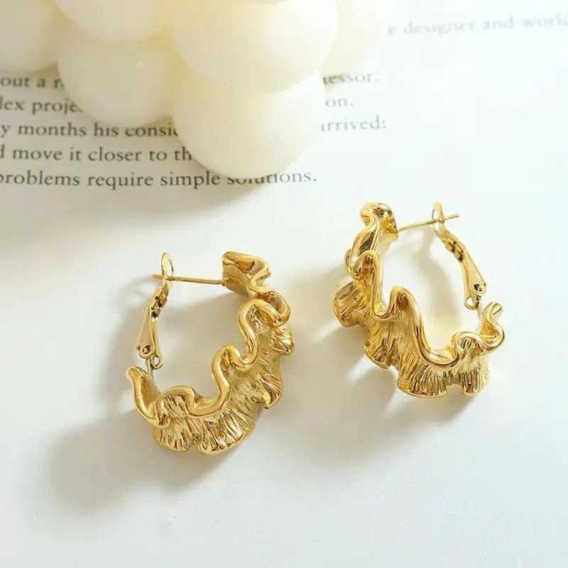 AROS DE BAÑO EN ORO AMARILLO 18K CON DISEÑO EXCLUSIVO - 2