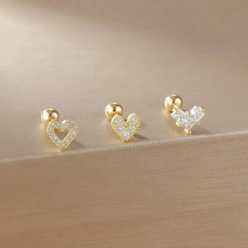 SET DE 3 PARES DE AROS CORAZON HIPOALERGE NICOS EN BAÑO DE ORO 18K - 1