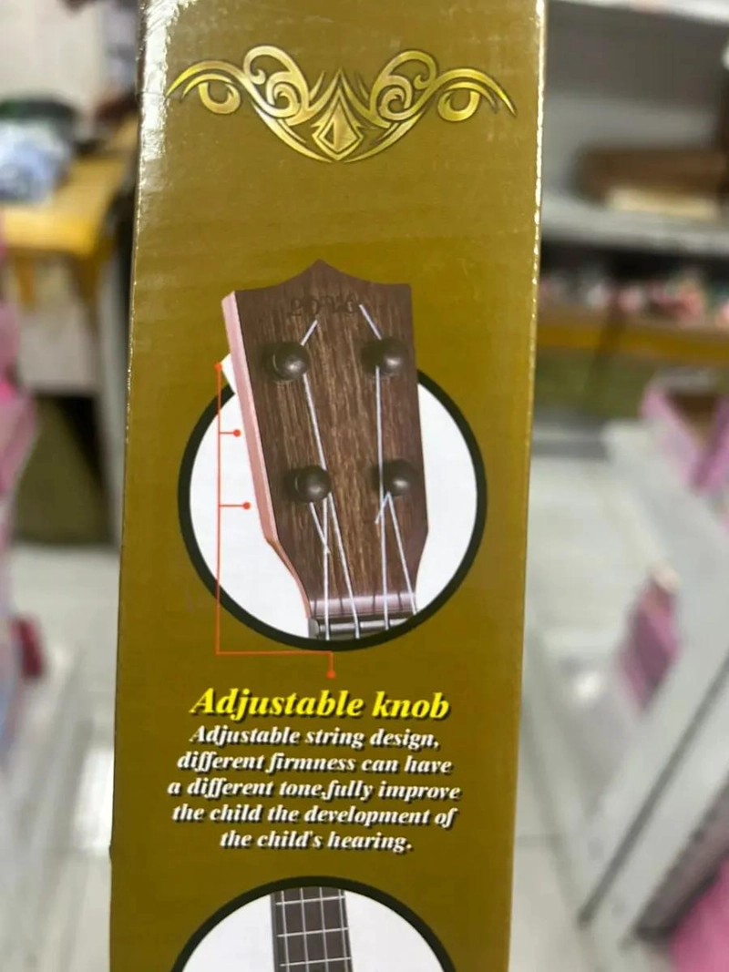 UKELELE INFANTIL DE MADERA 4 CUERDAS PARA NIÑOS - 2
