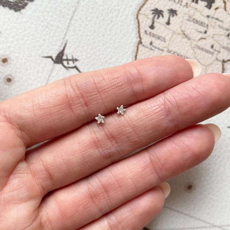 AROS ESTRELLAS BRILLANTES DE PLATA FINA PARA PERFORACIONES - 3