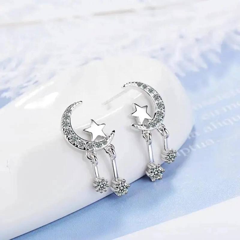 AROS ELEGANTES EN FORMA DE LUNA Y ESTRELLAS BAÑADOS EN PLATA - 2