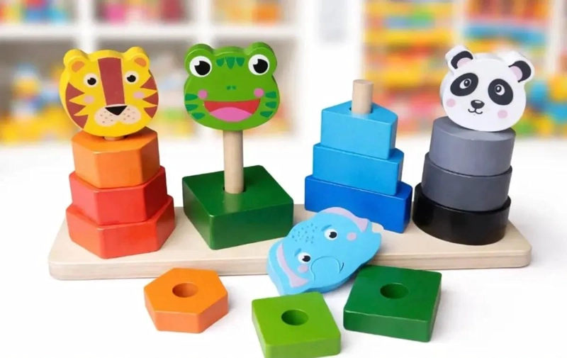 JUGUETE DIDACTICO APILABLE DE MADERA CON ANIMALES Y FORMAS - 1