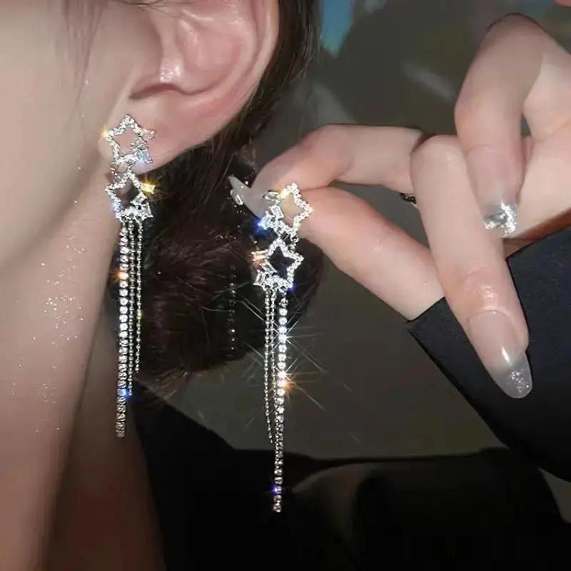 AROS PENDIENTES DOBLE ESTRELLA CON STRASS Y BOLSA JOYAS - 4