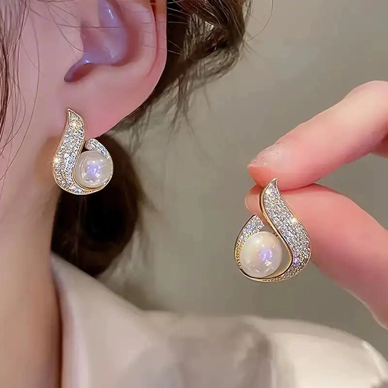 AROS DE STRASS CON IMITACION DE PERLAS Y BOLSA DE JOYAS - 6