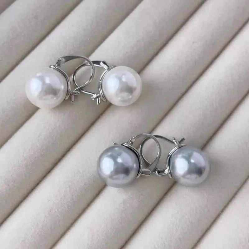 AROS ELEGANTES DE NACAR CON GANCHO DE PLATA PULIDA - 1