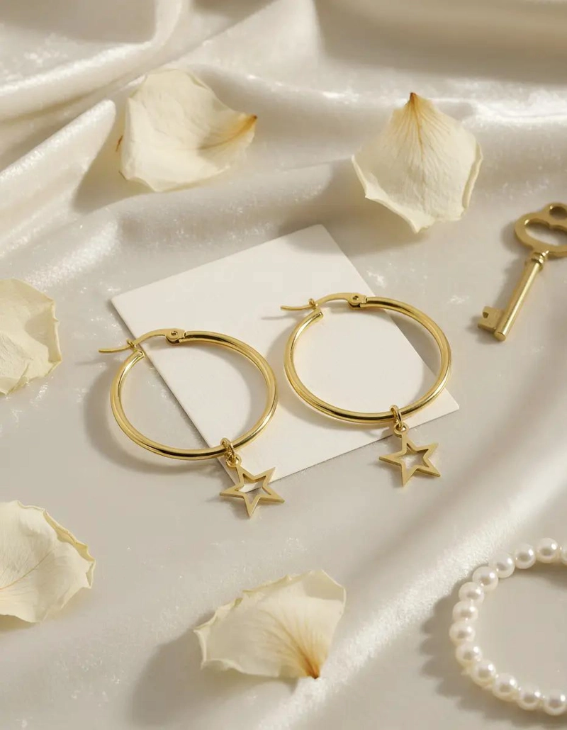AROS ARGOLLAS CON DIJE DE ESTRELLA EN ACERO DORADO 30MM - 2